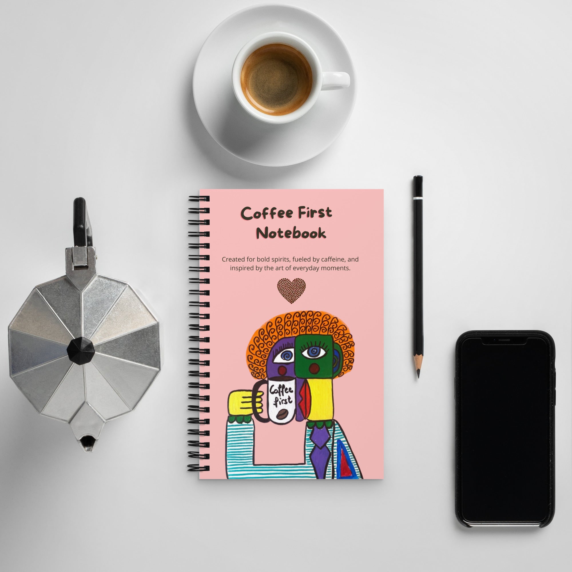 Coffee First carnet posé sur une table