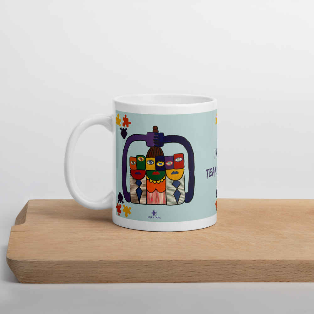I am a team player mug by Unica Nota