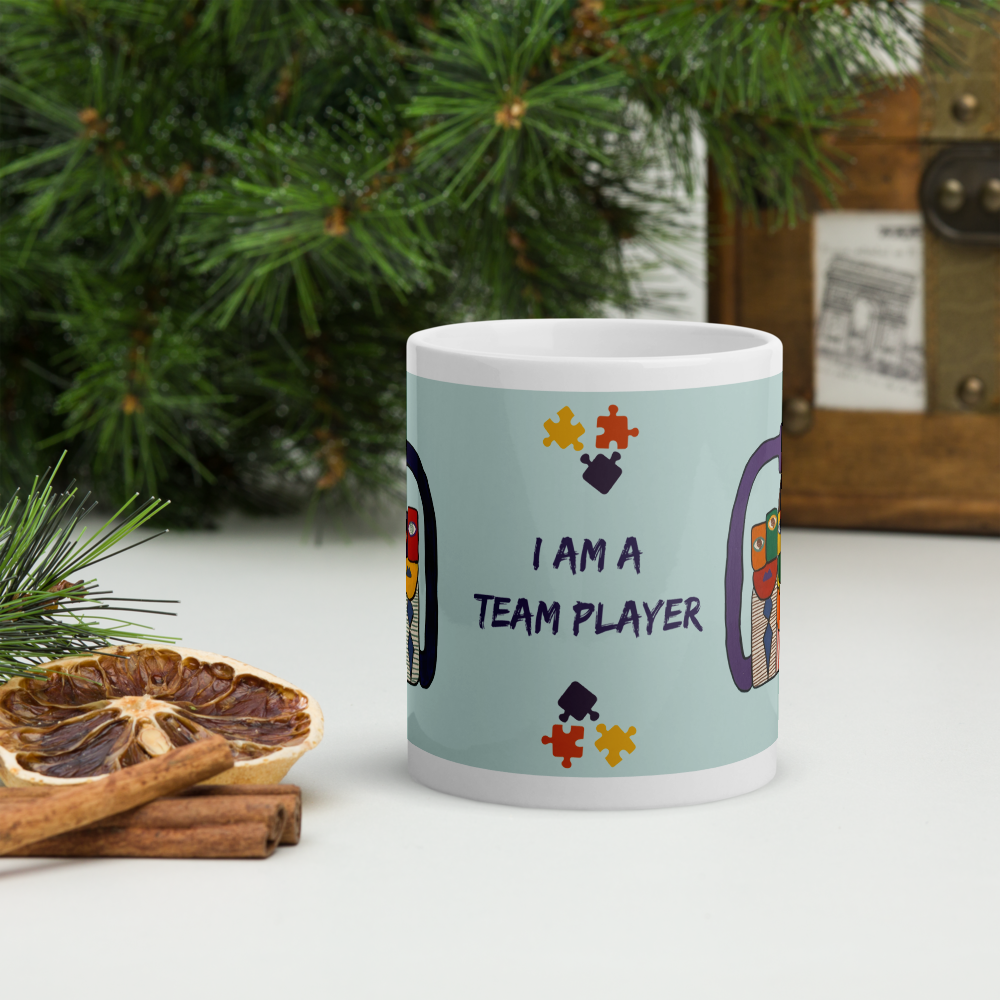 I am a team player mug by Unica Nota