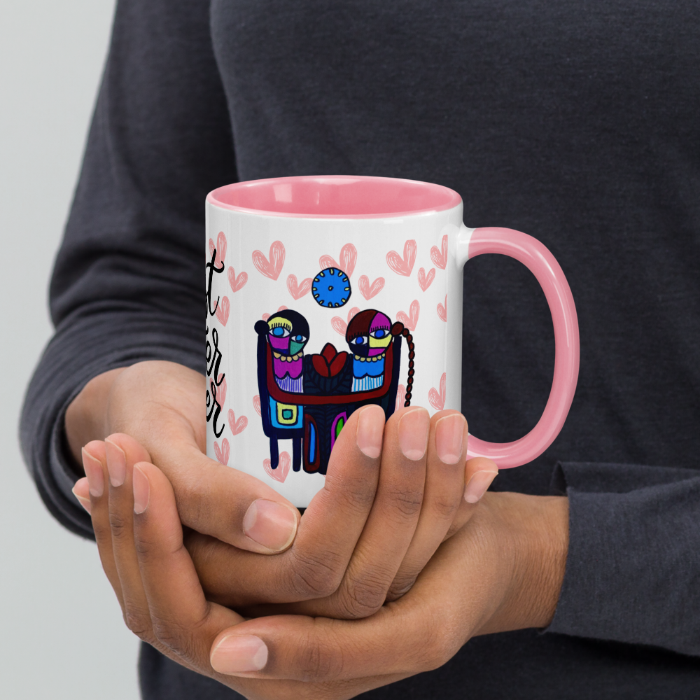 Holding the Unica Nota best sister ever mug