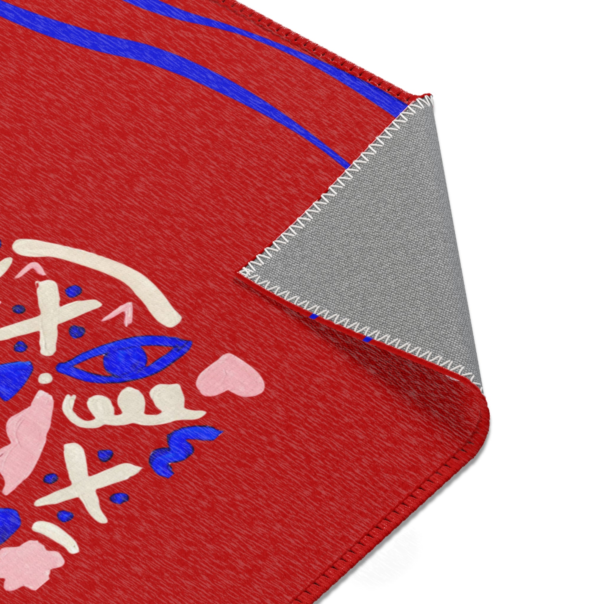 Texture et couleurs du tapis Origines – design rouge profond – Unica Nota

