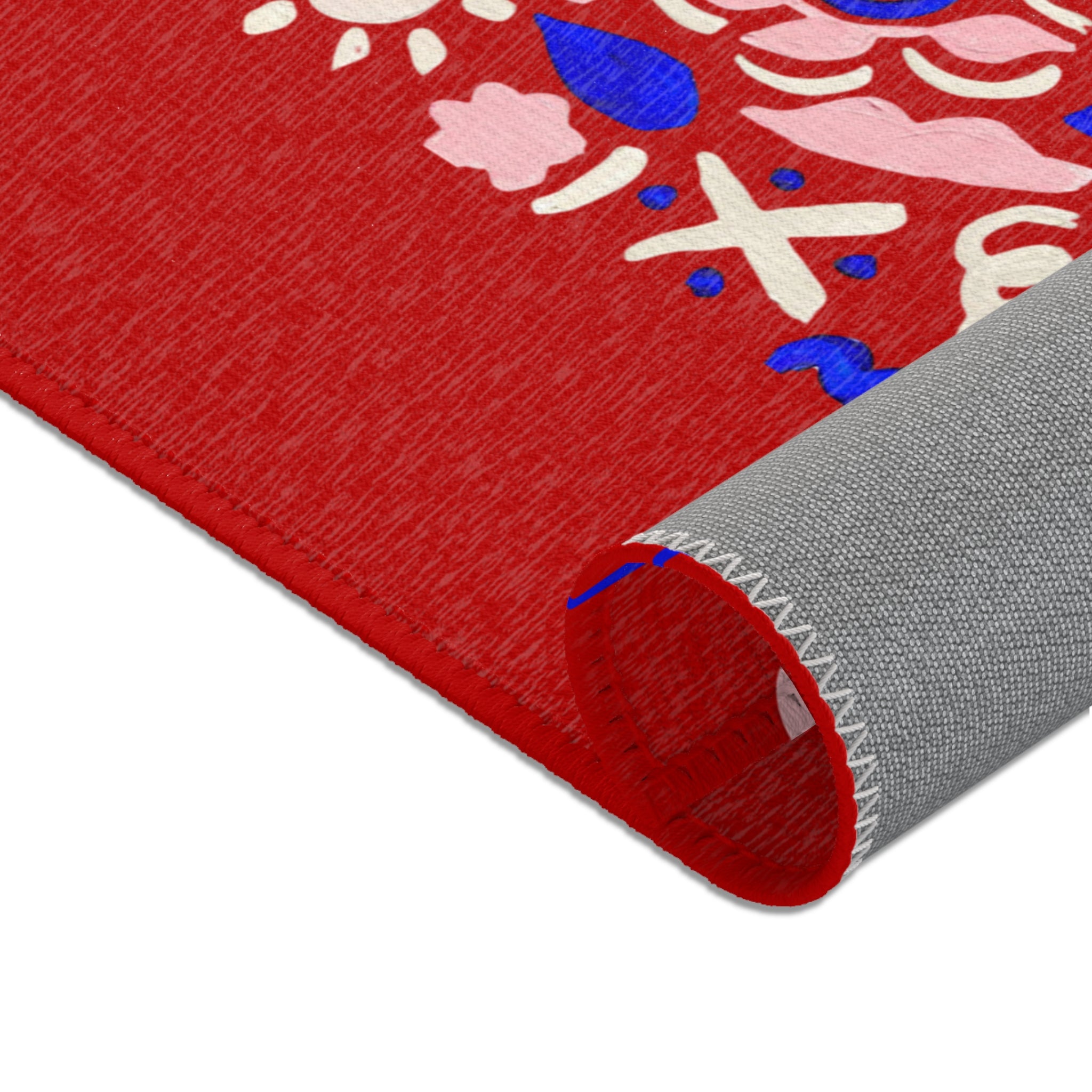 Texture et couleurs du tapis Origines – design rouge profond – Unica Nota

